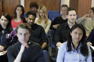University of St Andrews School of Management taught postgrads seated in a seminar