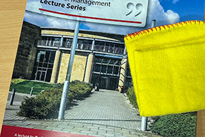 CREDI event image showing the Gateway Building on a poster with a yellow duster